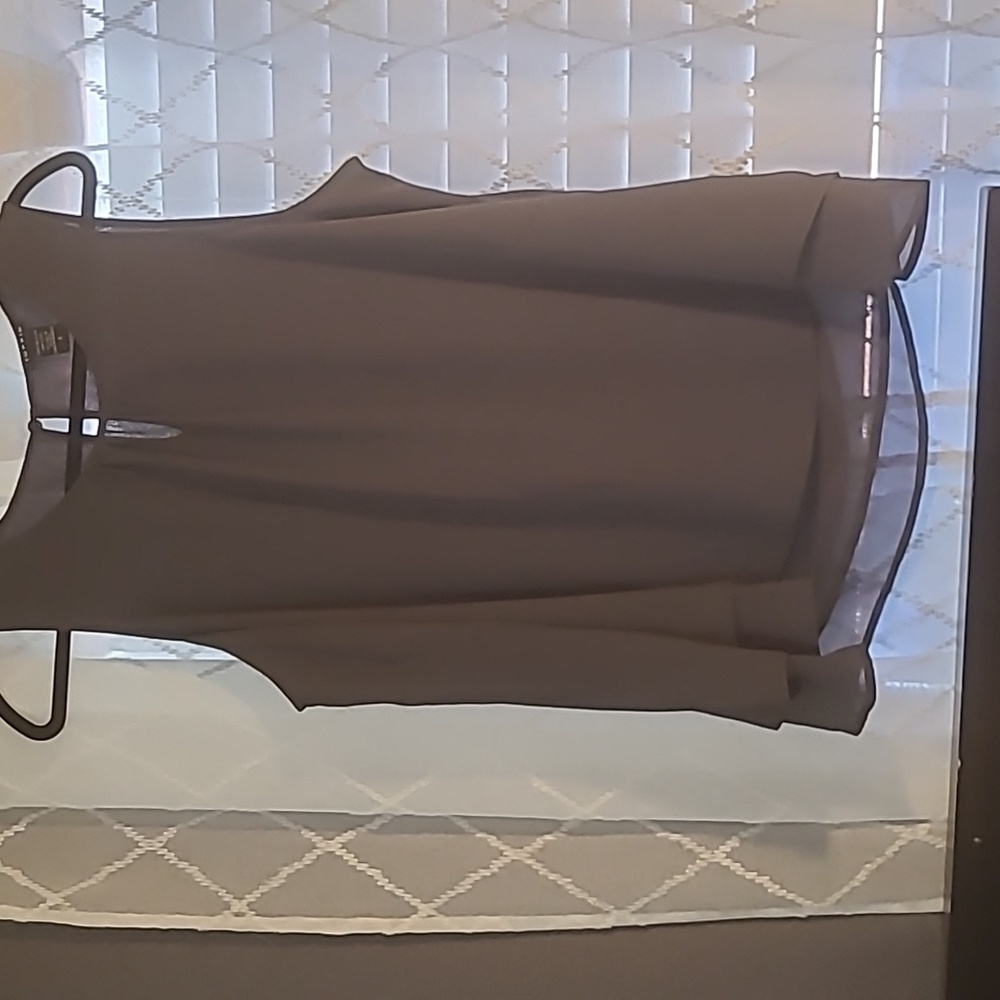 Gray top from Torrid.  Button closure in the back.